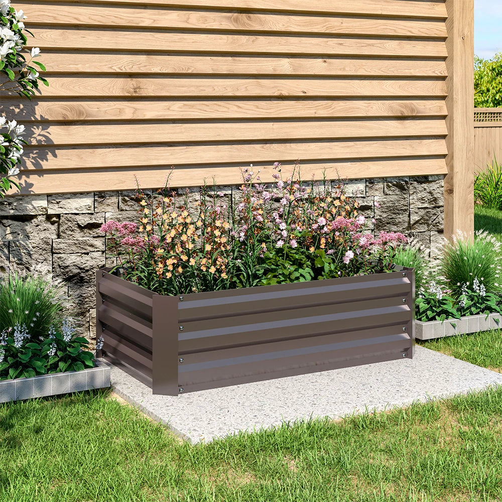Outdoor raised bed planter with dark gray slatted panels, front and side view.