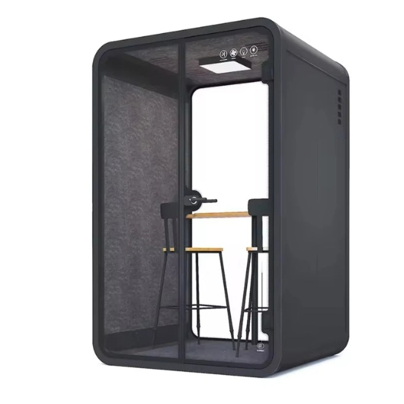 Portable recording pod in dark gray with open glass front, showing chairs and equipment