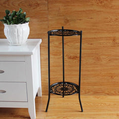 Black metal 2-tier plant pot stand with open frame and ornate circular scroll base