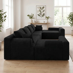 Black modular U-shaped sectional sofa with wide arms and layered seat cushions