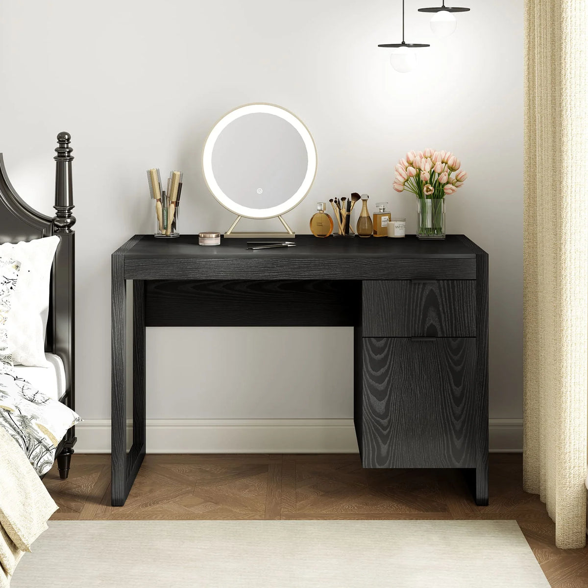 Black wooden computer desk with open center shelf and two front drawers