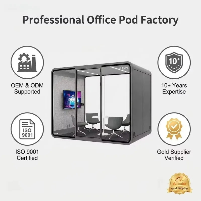 Portable office pod with dark frame and multi-pane glass front, shown in studio view