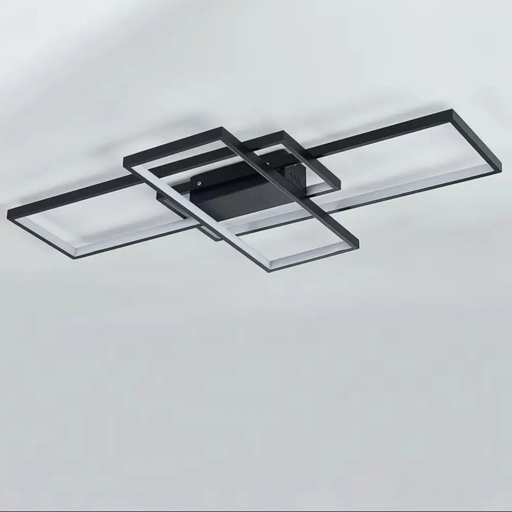 Modern rectangular LED ceiling chandelier with black frame and four rectangular light panels