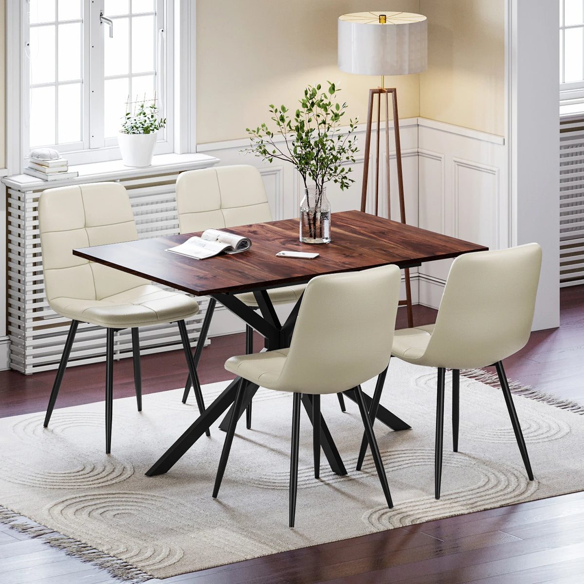 Rectangular dining table with 4 upholstered chairs, light beige seats, black metal table legs
