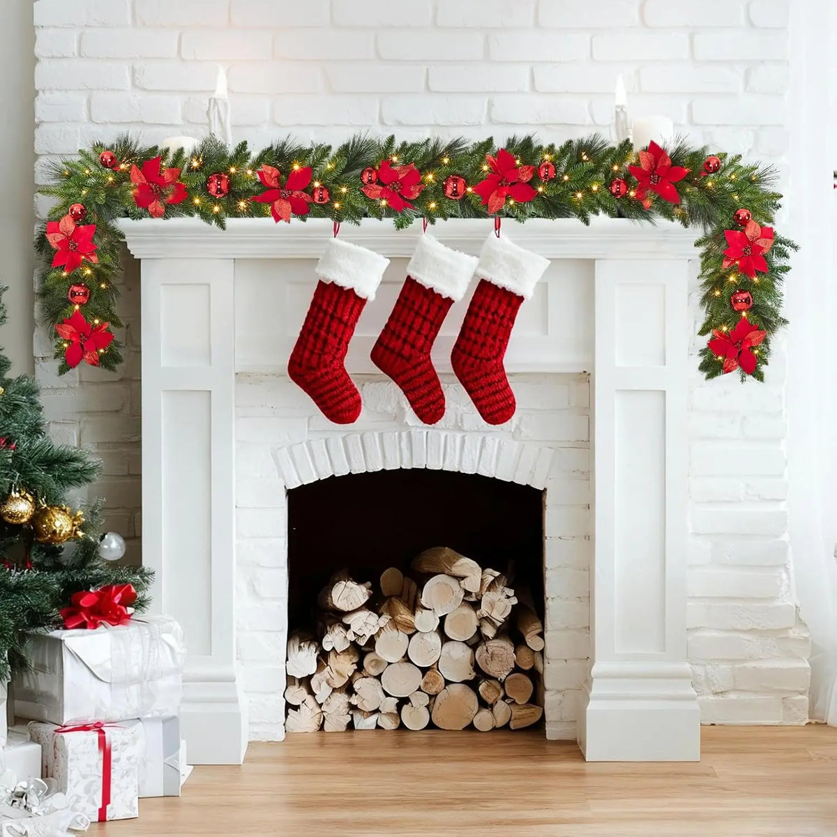 Christmas fireplace mantel garland with red ribbon bows and lit evergreen decoration
