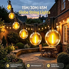 Outdoor G40 globe string lights with warm amber LED bulbs and black sockets