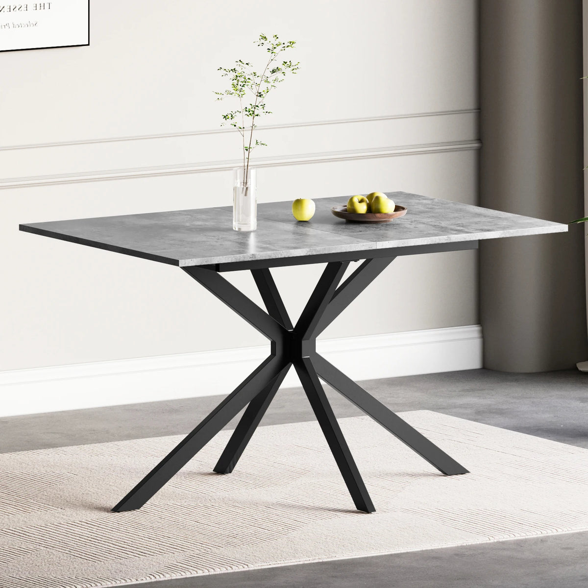 Rectangular extendable dining table with concrete-gray top and black X legs.