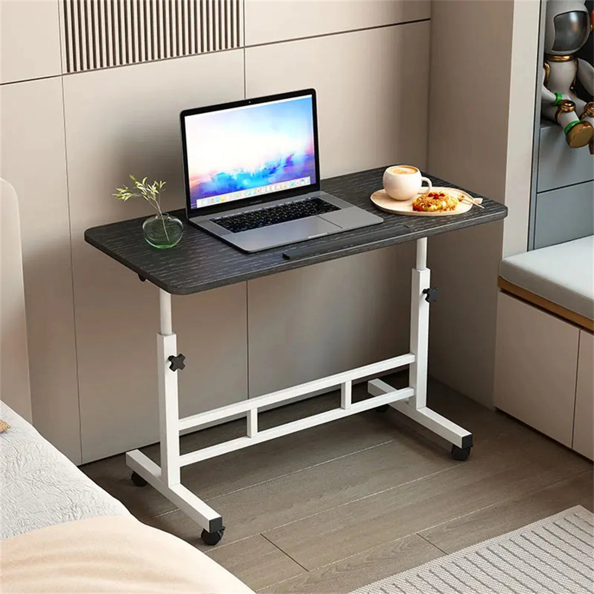 Black tabletop white standing desk with wheels and laptop-ready surface