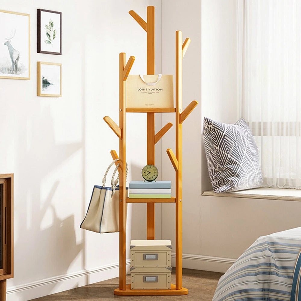 Natural wood coat rack with multiple hooks and two shelves, freestanding corner style