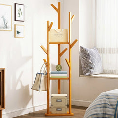 Natural wood coat rack with multiple hooks and two shelves, freestanding corner style