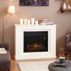 White electric fireplace mantel with glass-front firebox and orange flame effect