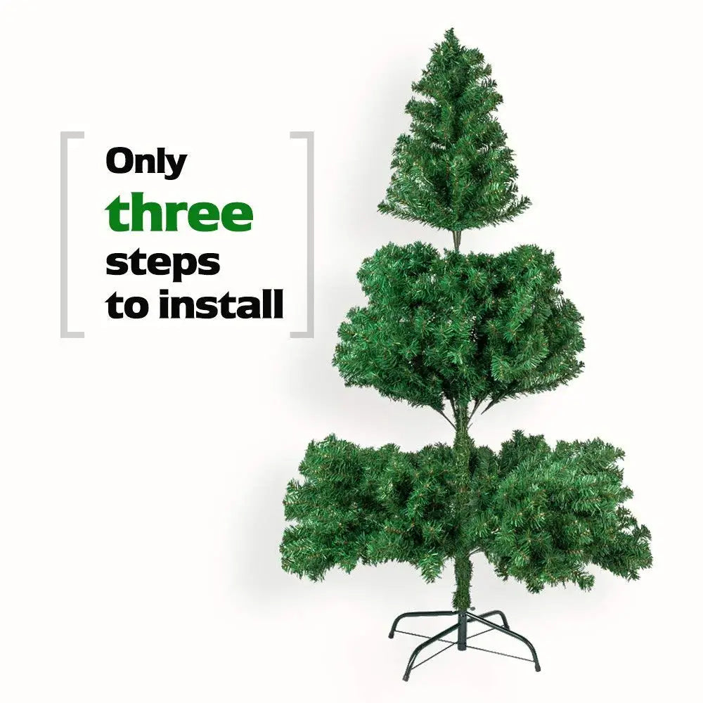 Green artificial Christmas tree with layered branches and metal tripod stand