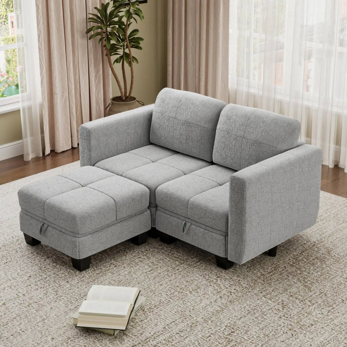 Grey modular sectional with chaise-style seat blocks and thick back cushions