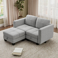 Grey modular sectional with chaise-style seat blocks and thick back cushions